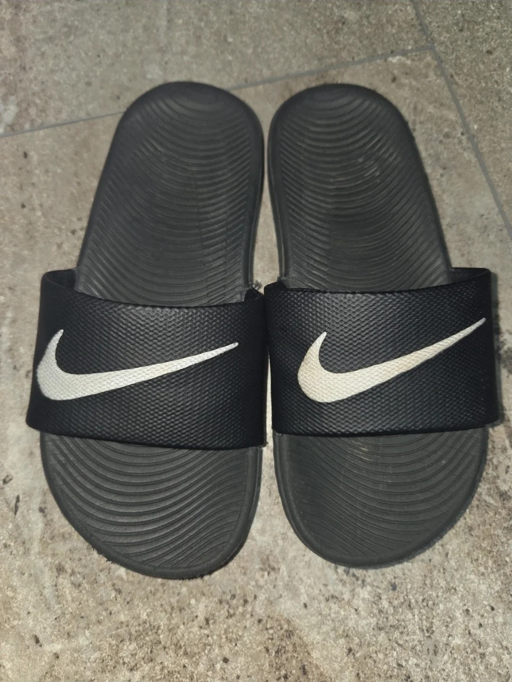 - Nike Kids Black Slides with White Swoosh